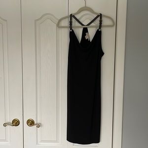 Black Michael Kors dress with leather like straps. Size M